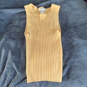 no sleeve tank with a hole by the tag